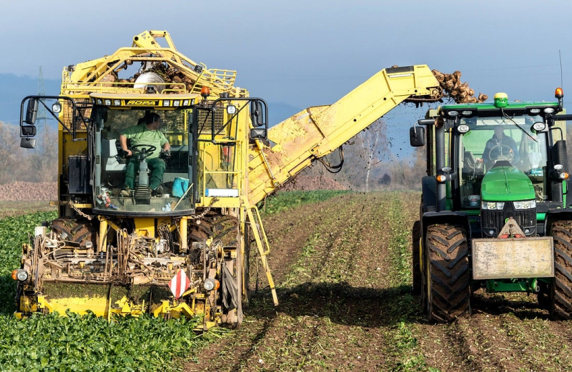 Farm vehicles in a field