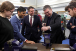 Iain and Rishi with local apprentices